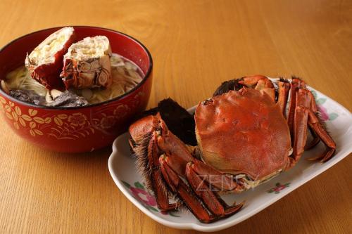 缁